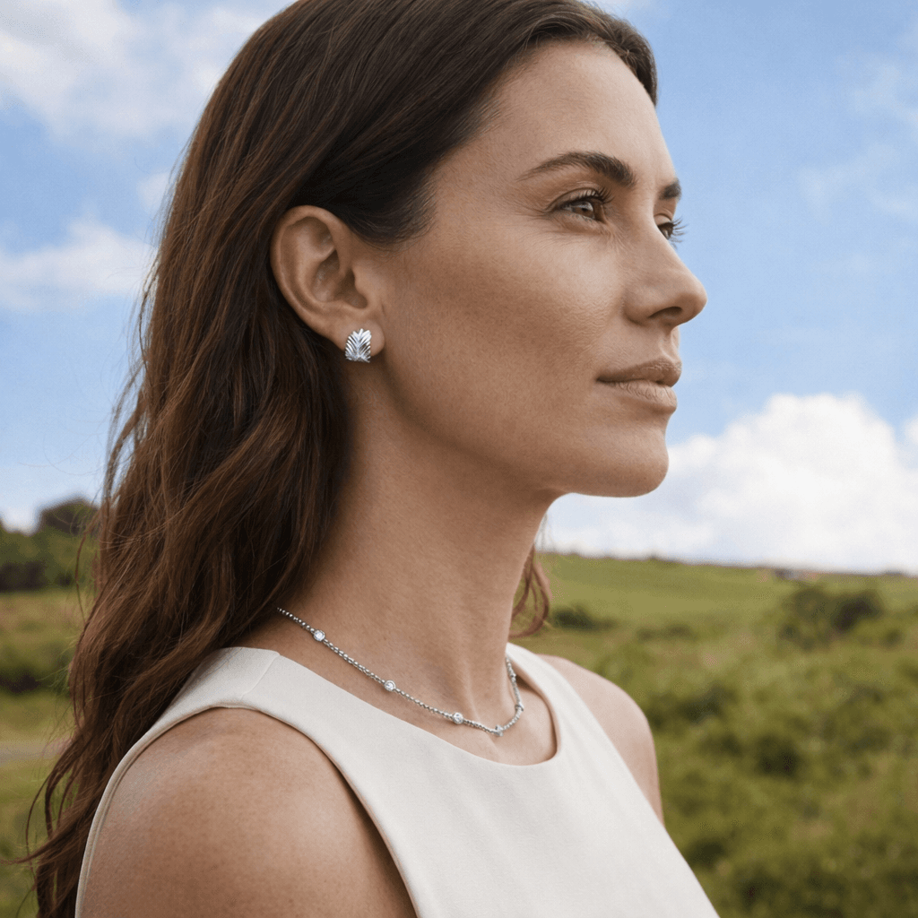 Woman wearing sterling jewelry in an outdoor setting